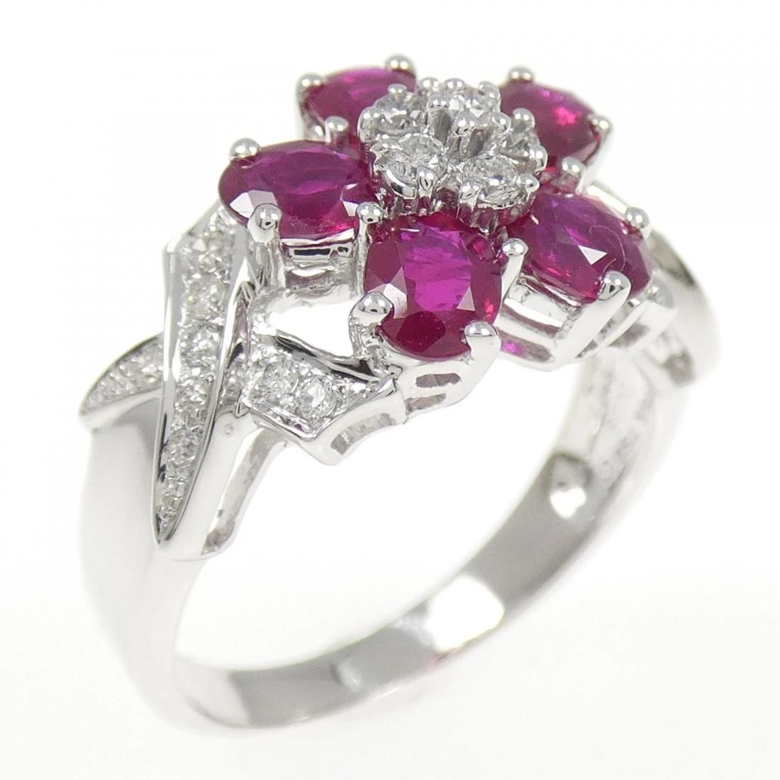 750WG FLOWER RUBY RING: 750WG Flower Ruby Ring Brand: Unbranded Type: Ring Material: 750 White Gold, Main Stone/Creation ruby Color: white gold Size: 7.5-8US Accessories: None Accessories Notice: When purchasing