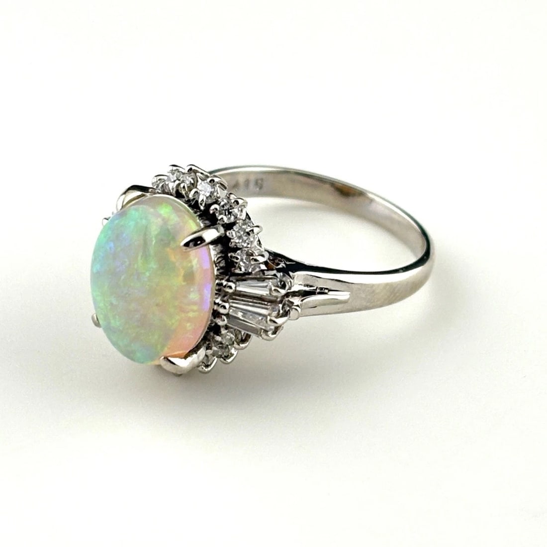 OPAL DESIGN PLATINUM MELEE DIAMOND RING PT900: opal design Platinum Melee diamond Ring Pt900 Brand: Unbranded Type: Ring Material: Pt900, Main Stone/Creation opal Color: Platinum Size: US 5.5 Accessories: None Accessories Notice: When