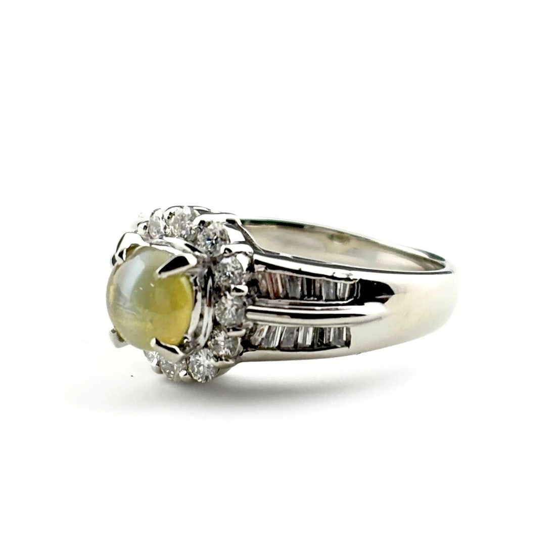 CHRYSOBERYL CAT'S EYE DESIGN PLATINUM MELEE DIAMOND RING: Chrysoberyl cat's eye design Platinum Melee diamond Ring Brand: Unbranded Type: Ring Material: Pt900, Color: Platinum Size: US 4 to 4.5 Accessories: None Accessories Notice: When purchasing