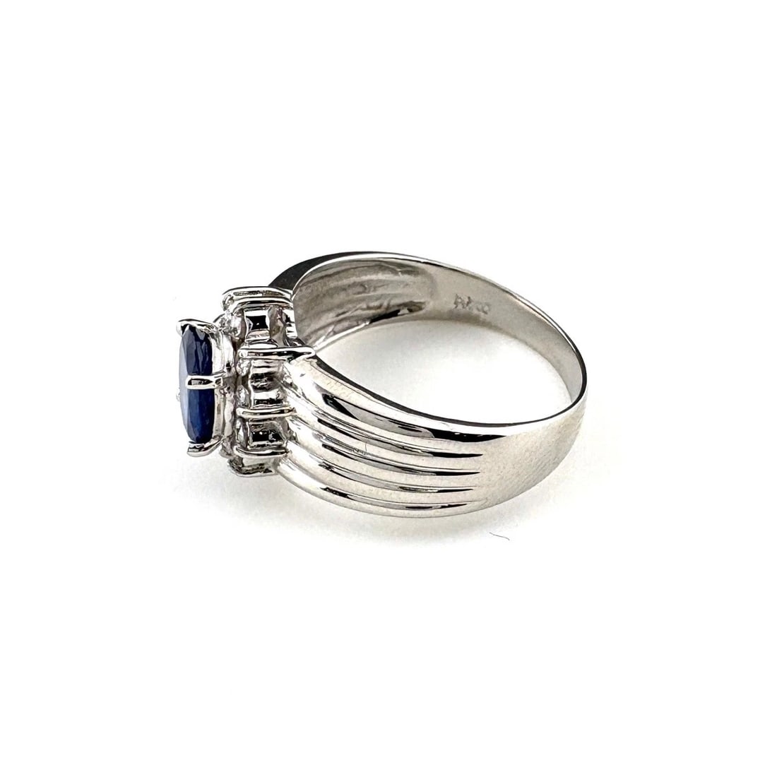 SAPPHIRE DESIGN RING PLATINUM MELEE DIAMOND RING: sapphire design Ring Platinum Melee diamond Ring Brand: Unbranded Type: Ring Material: Pt900, Main Stone/Creation sapphire Color: Platinum Size: US 6.5 Accessories: None Accessories Notice: