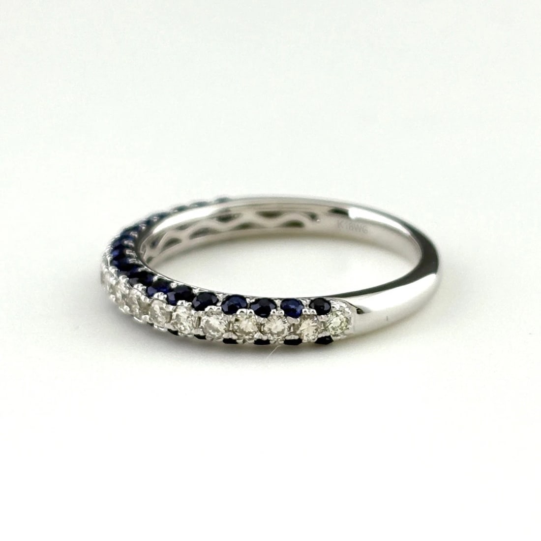 SAPPHIRE DESIGN WG WHITEGOLD RING MELEE DIAMOND: sapphire design WG WhiteGold ring Melee diamond Brand: Unbranded Type: Ring Material: 18K, Main Stone/Creation sapphire Color: White Gold Size: US 6.5 Accessories: None Accessories Notice: