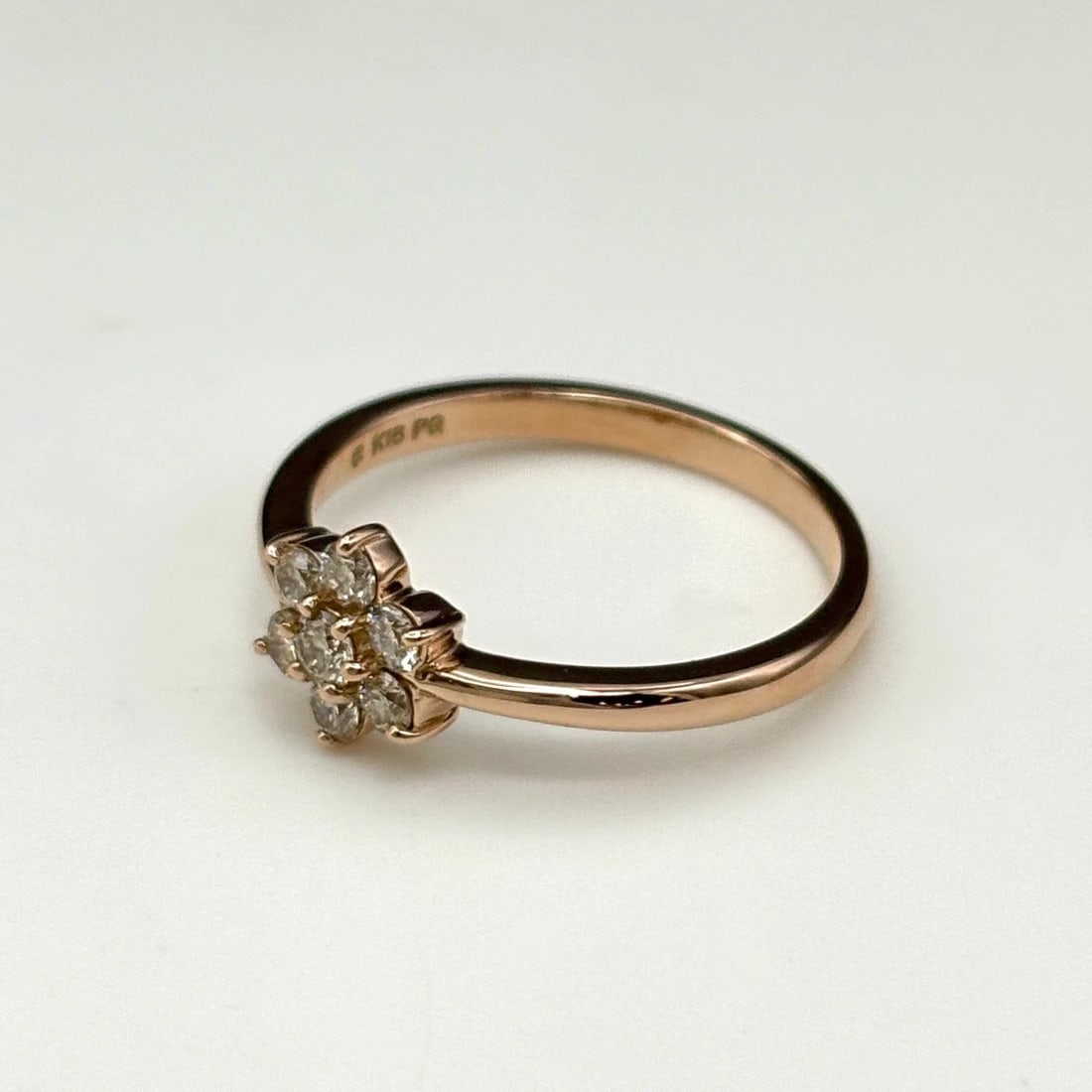 FLOWER MOTIF DESIGN PG PINK GOLD MELEE DIAMOND FLOWER RING: flower motif design PG Pink Gold Melee Diamond Flower Ring Brand: Unbranded Type: Ring Material: 18K, Color: Pink Gold Size: US 6 Accessories: None Accessories Notice: When purchasing