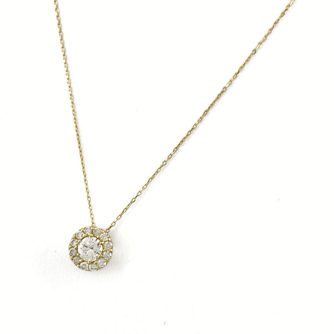 DIAMOND DESIGN YG YELLOWGOLD RING MELEE DIAMOND NECKLACE: Diamond design YG YellowGold ring Melee diamond Necklace Brand: Unbranded Type: Necklace Material: 18K, Color: Yellow Gold Size: Chain 40cm(15.7") Pendant size 7.5×7.6mm(0.3") Accessories: