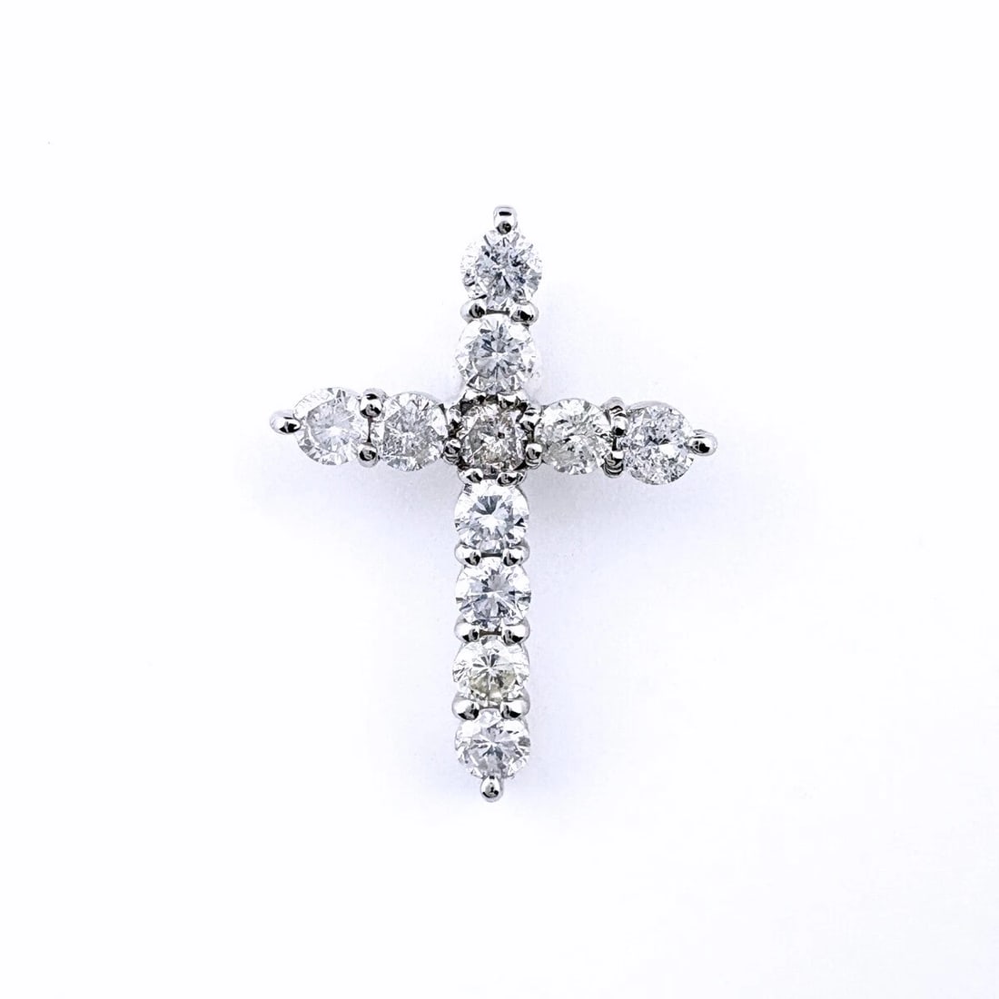 CROSS MOTIF PENDANT HEAD PLATINUM CROSS MELEE DIAMOND: Cross motif Pendant Head Platinum cross Melee diamond Brand: Unbranded Type: Pendant Head Material: Pt900, Color: Platinum Size: Pendant size 21.9×16.2mm(0.9") Inside diameter of the bail