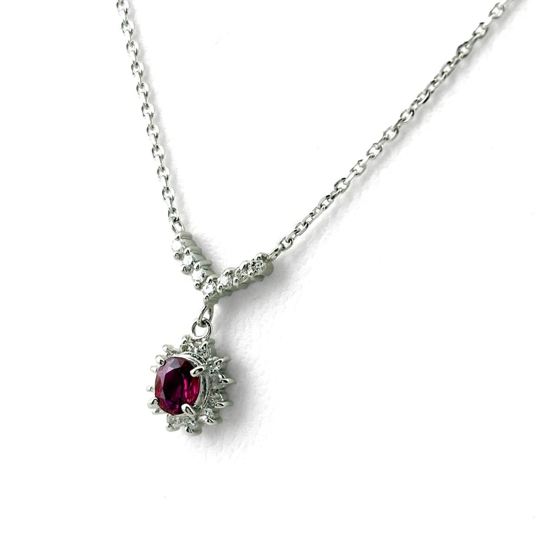 RUBY DESIGN NECKLACE PLATINUM MELEE DIAMOND: Ruby Design Necklace Platinum Melee diamond Brand: Unbranded Type: Necklace Material: Pt850, Main Stone/Creation Ruby Color: Platinum Size: Chain 38.5cm(15.2") Total length of the pendant head inc