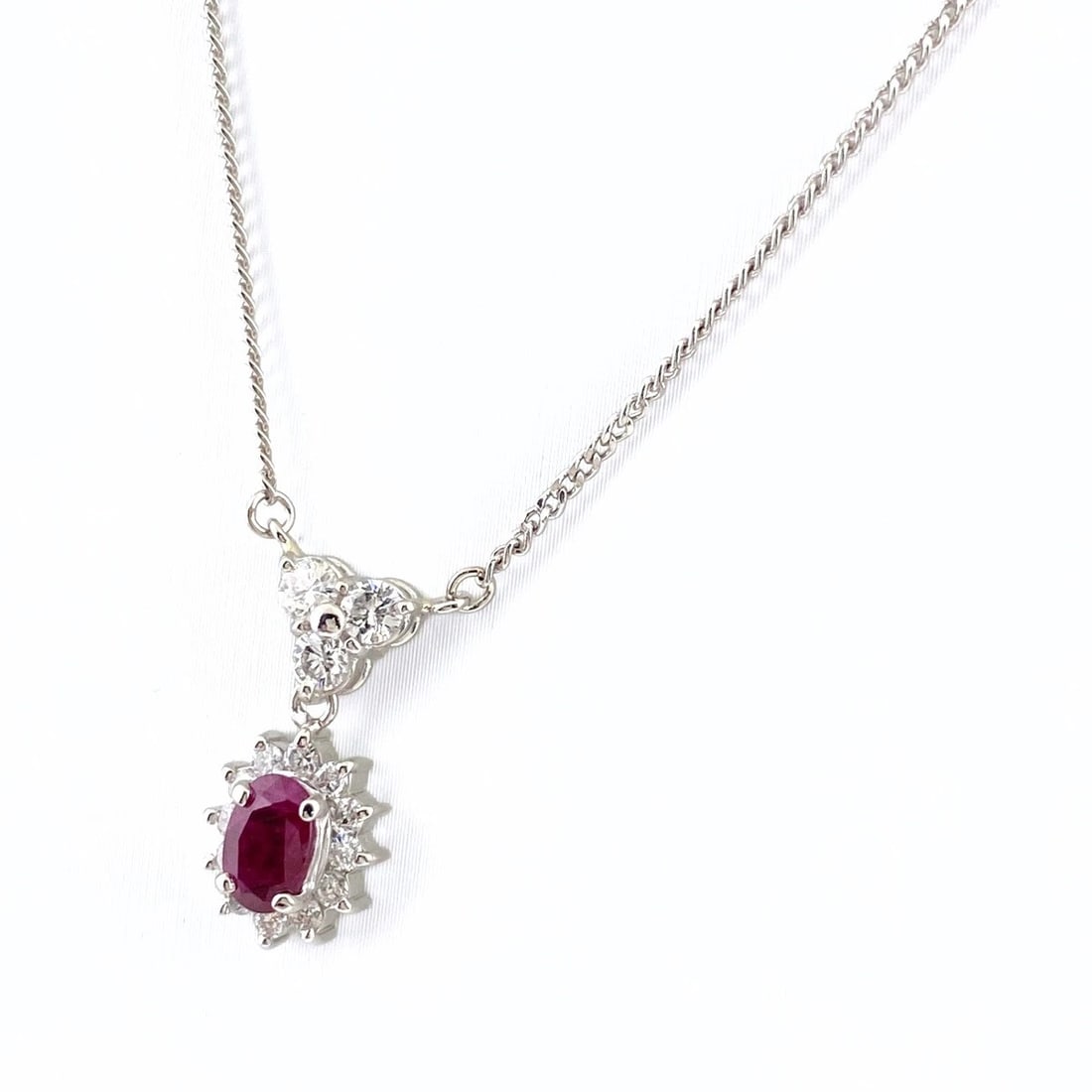 RUBY DESIGN NECKLACE PLATINUM PENDANT: Ruby Design Necklace Platinum Pendant Brand: Unbranded Type: Necklace Material: Pt850, Main Stone/Creation Ruby Color: Platinum Size: Chain 40cm(15.7")Pendant size 17.6×10.1mm(0.7") Accessories: