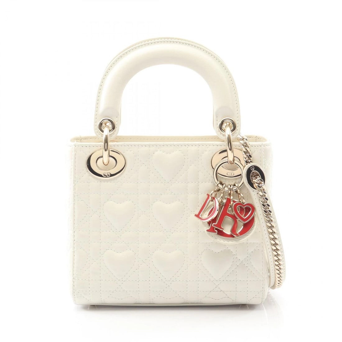 CHRISTIAN DIOR MINI HEART CANNAGE WOMEN CROSSBODY HANDBAG: Christian Dior Mini Heart Cannage Women crossbody Handbag Brand: Dior Type: Handbag Material: leather Color: White??ish colors Size: (H:5.5" x W:6.5" x D:2.8") Handle?25cm(9.8") Accessories: