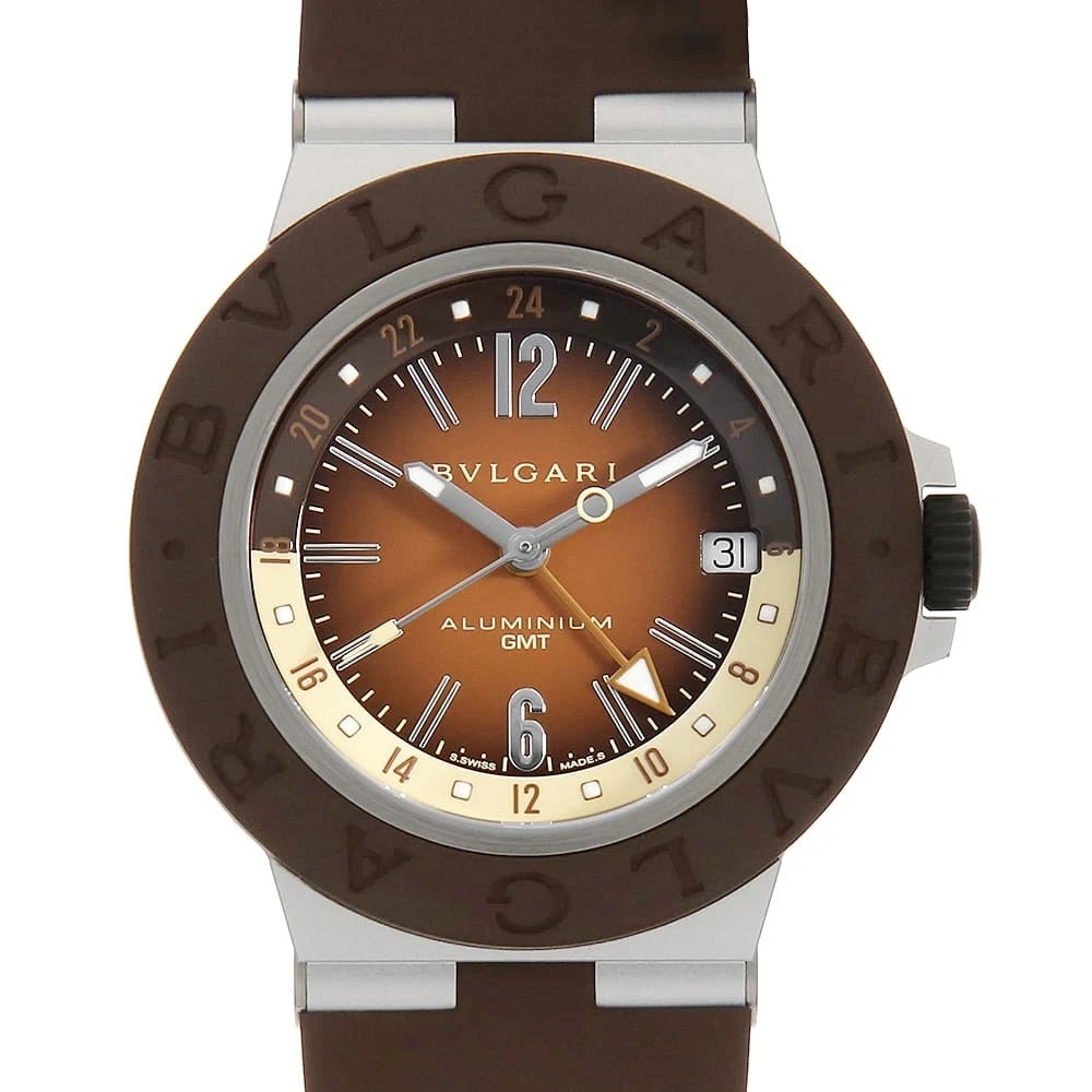 BVLGARI ALUMINUM GMT FENDER WRIST WATCH: BVLGARI Aluminum GMT Fender Wrist Watch Brand: BVLGARI Type: Wrist watch Material: Band Material rubber, Case Material Aluminum Color: Brown Size: Case:W40mm Accessories: None Accessories