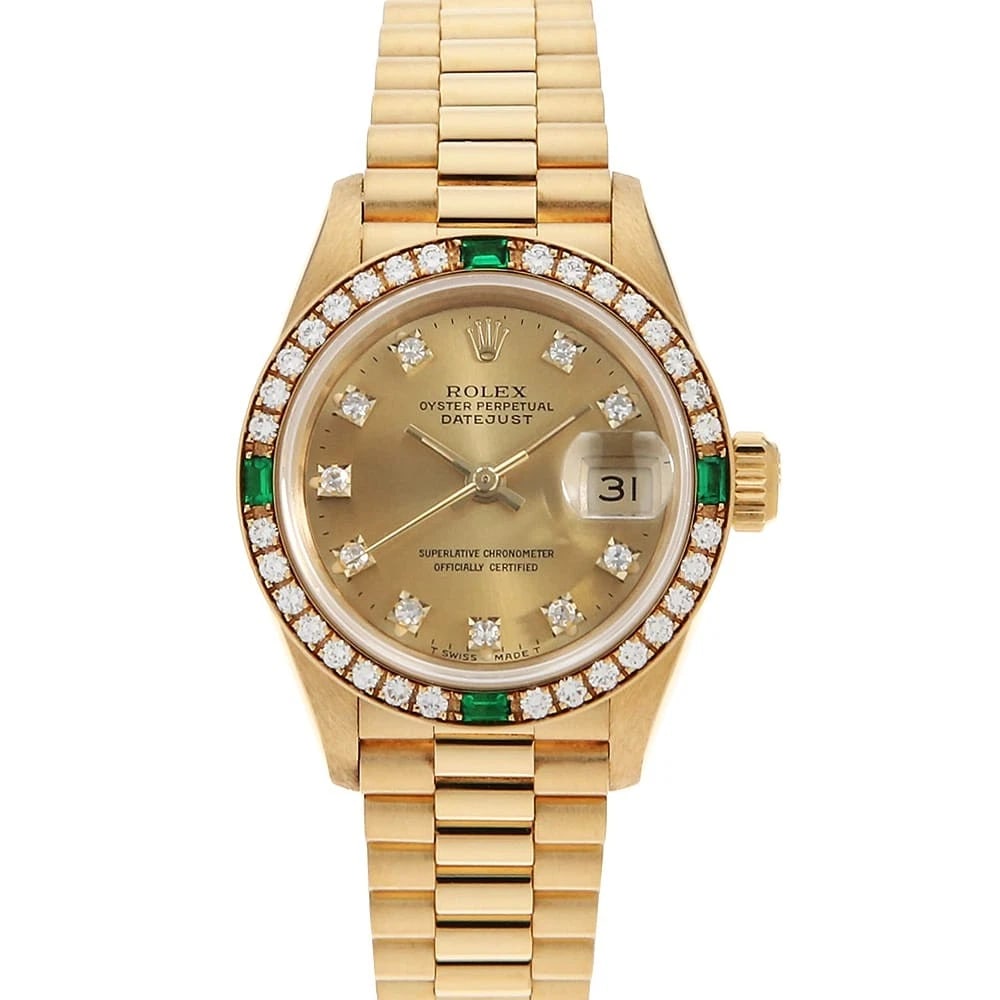 ROLEX DATEJUST BEZEL DIAMOND EMERALD CHAMPAGNE WRIST WATCH: ROLEX Datejust bezel diamond emerald Champagne Wrist Watch Brand: ROLEX Type: Wrist watch Material: Band Material Yellow Gold, Case Material Yellow Gold Color: Champagne Gold Size: Case:W26mm Circ