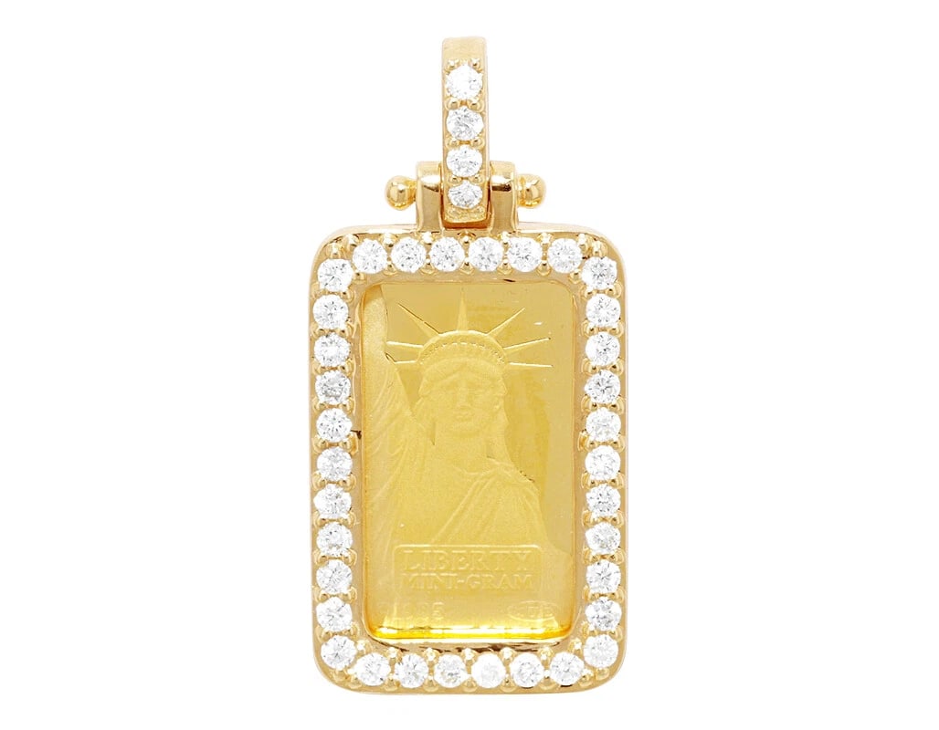 STATUE OF LIBERTY REAL DIAMOND FRAME PENDANT YELLOW GOLD: Statue Of Liberty Real Diamond Frame Pendant Yellow Gold Brand: None Type: Necklace Material: 14k Yellow Gold, Main Stone/Creation Natural Color: Yellow Gold Size: Dimension 1.2" x 0.6" 