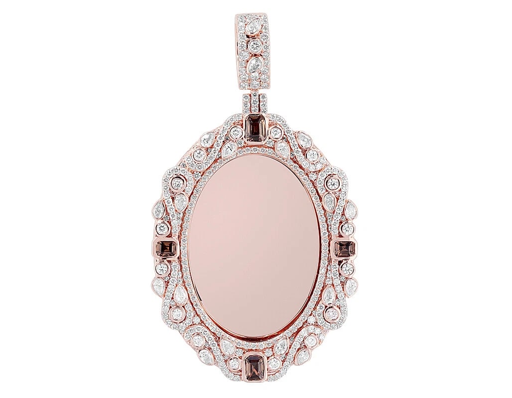 BEZEL REAL DIAMOND SWIVEL MEMORY PENDANT: Bezel Real Diamond Swivel Memory Pendant Brand: None Type: Pendant Material: 10k Rose Gold, Main Stone/Creation Natural Color: Rose Gold Size: Dimension L 2", W 1.1" Accessories: None