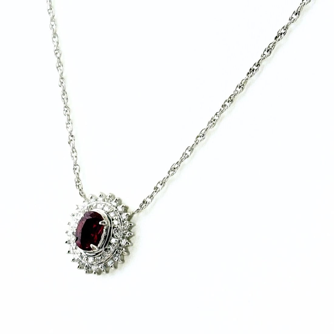 RUBY DESIGN NECKLACE PLATINUM MELEE DIAMOND: Ruby Design Necklace Platinum Melee diamond Brand: Unbranded Type: Necklace Material: Pt850, Main Stone/Creation Ruby Color: Platinum Size: Chain 40.5cm(15.9") Pendant size 13.1×11.5mm(0.5") 