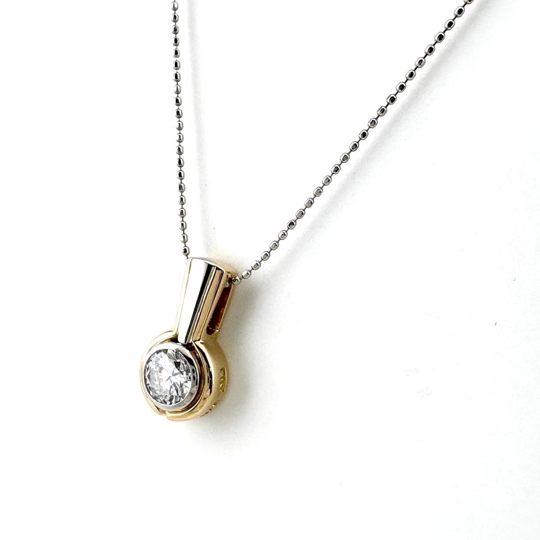 DIAMOND DESIGN NECKLACE PLATINUM: Diamond design necklace Platinum Brand: Unbranded Type: Necklace Material: Pt900, Color: Yellow Gold Size: Chain 39.5cm(15.6") Total length of the pendant head including a bail