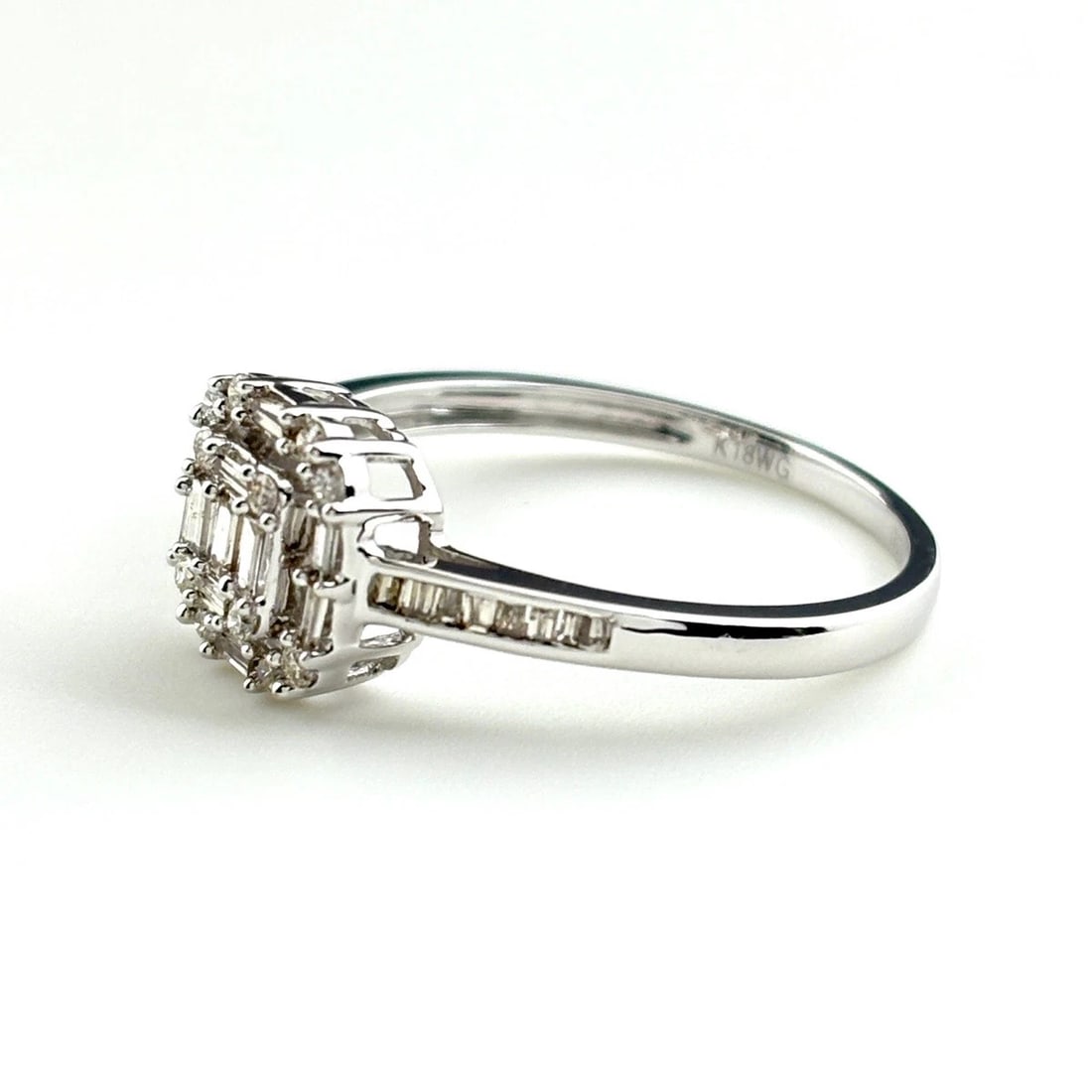 MELEE DIAMOND DESIGN RING WG WHITEGOLD: Melee diamond design ring WG WhiteGold Brand: Unbranded Type: Ring Material: 18K, Color: White Gold Size: US 8 to 8.5 Accessories: None Accessories Notice: When purchasing pre-owned goods,