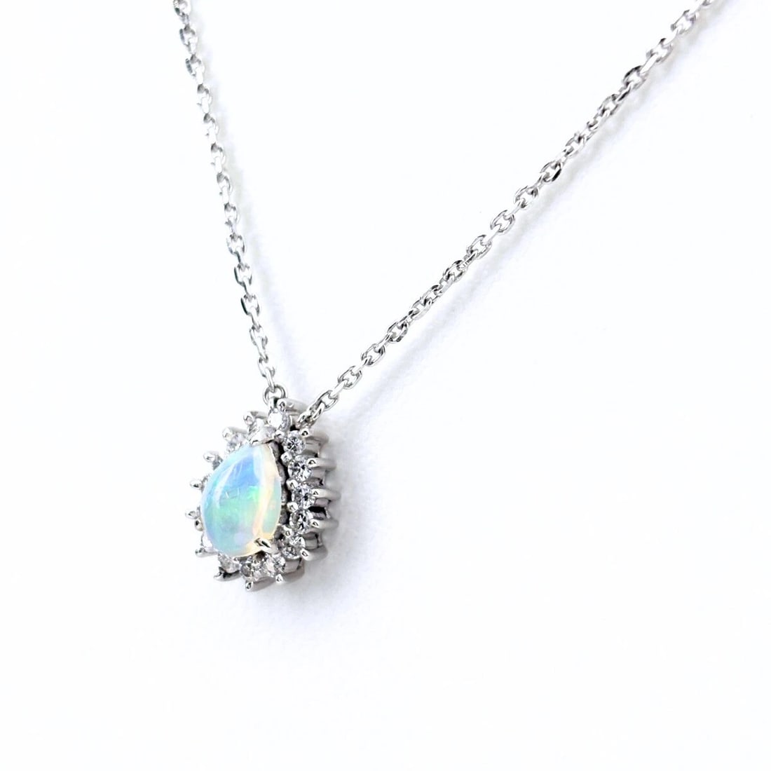 OPAL DESIGN NECKLACE PLATINUM PENDANT MELEE: Opal design necklace Platinum Pendant Melee Brand: Unbranded Type: Necklace Material: Pt850, Main Stone/Creation Opal Color: Platinum Size: Chain 42cm(16.5") Pendant size 12.8×10.5mm(0.5") 