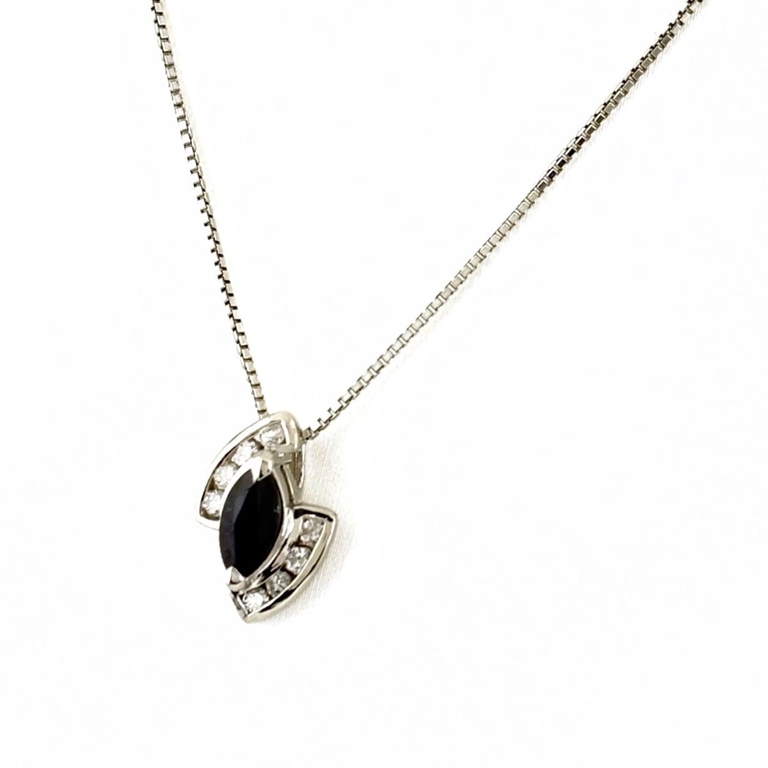 SAPPHIRE DESIGN NECKLACE PLATINUM PENDANT: Sapphire design necklace Platinum Pendant Brand: Unbranded Type: Necklace Material: Pt850, Main Stone/Creation Sapphire Color: Platinum Size: Chain 39cm(15.4") Pendant size 14.0×9.2mm(0.6") 