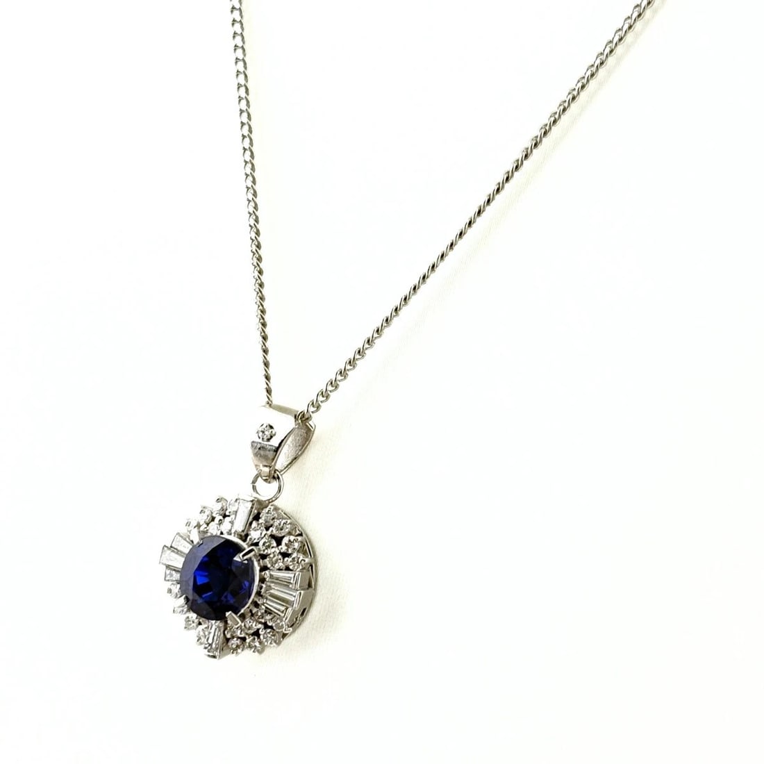 SAPPHIRE DESIGN PLATINUM PENDANT MELEE DIAMOND NECKLACE: Sapphire design Platinum Pendant Melee diamond Necklace Brand: Unbranded Type: Necklace Material: Pt900, Main Stone/Creation Sapphire Color: Platinum Size: Chain 42cm(16.5") Total length of
