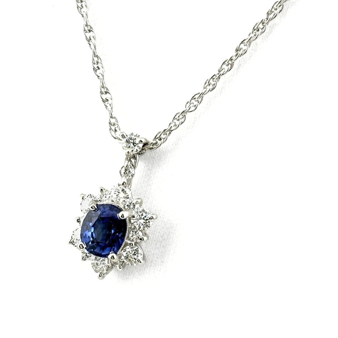 SAPPHIRE DESIGN PLATINUM MELEE DIAMOND PENDANT NECKLACE: Sapphire design Platinum Melee diamond Pendant Necklace Brand: Unbranded Type: Necklace Material: Pt900, Main Stone/Creation Sapphire Color: Platinum Size: Chain 40cm(15.7") Pendant size 17.8×9.6