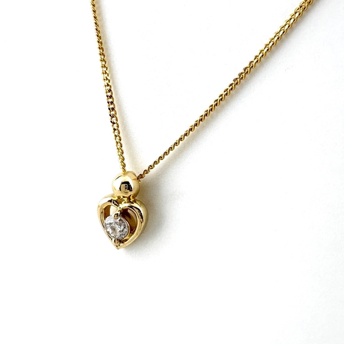 HEART MOTIF DESIGN NECKLACE YG YELLOW GOLD PENDANT: Heart motif design Necklace YG Yellow Gold Pendant Brand: Unbranded Type: Necklace Material: 18K, Color: Yellow Gold Size: Chain 40cm(15.7") Total length of the pendant head including a bail