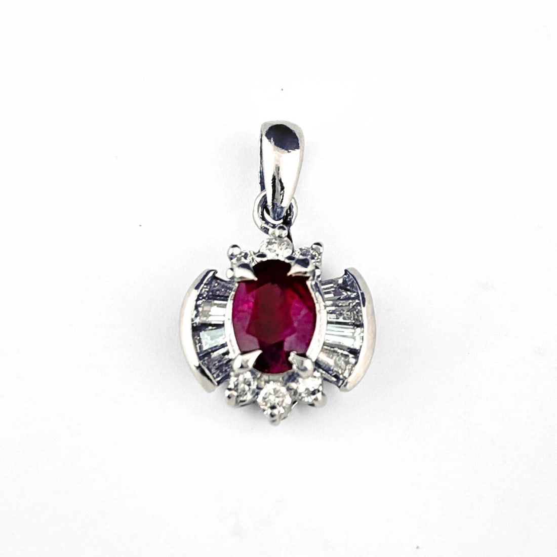 RUBY PENDANT HEAD PLATINUM MELEE DIAMOND: Ruby Pendant Head Platinum Melee diamond Brand: Unbranded Type: Pendant Head Material: Pt850, Main Stone/Creation Ruby Color: Platinum Size: Total length of the pendant head including a bail 19.0�