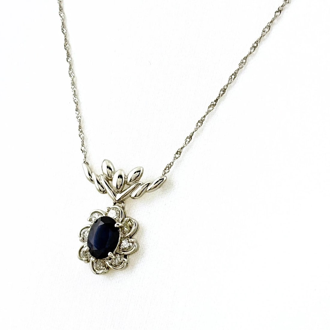 SAPPHIRE DESIGN NECKLACE PLATINUM PENDANT MELEE: Sapphire design necklace Platinum Pendant Melee Brand: Unbranded Type: Necklace Material: Pt900, Main Stone/Creation Sapphire Color: Platinum Size: Chain 40cm(15.7") Pendant size