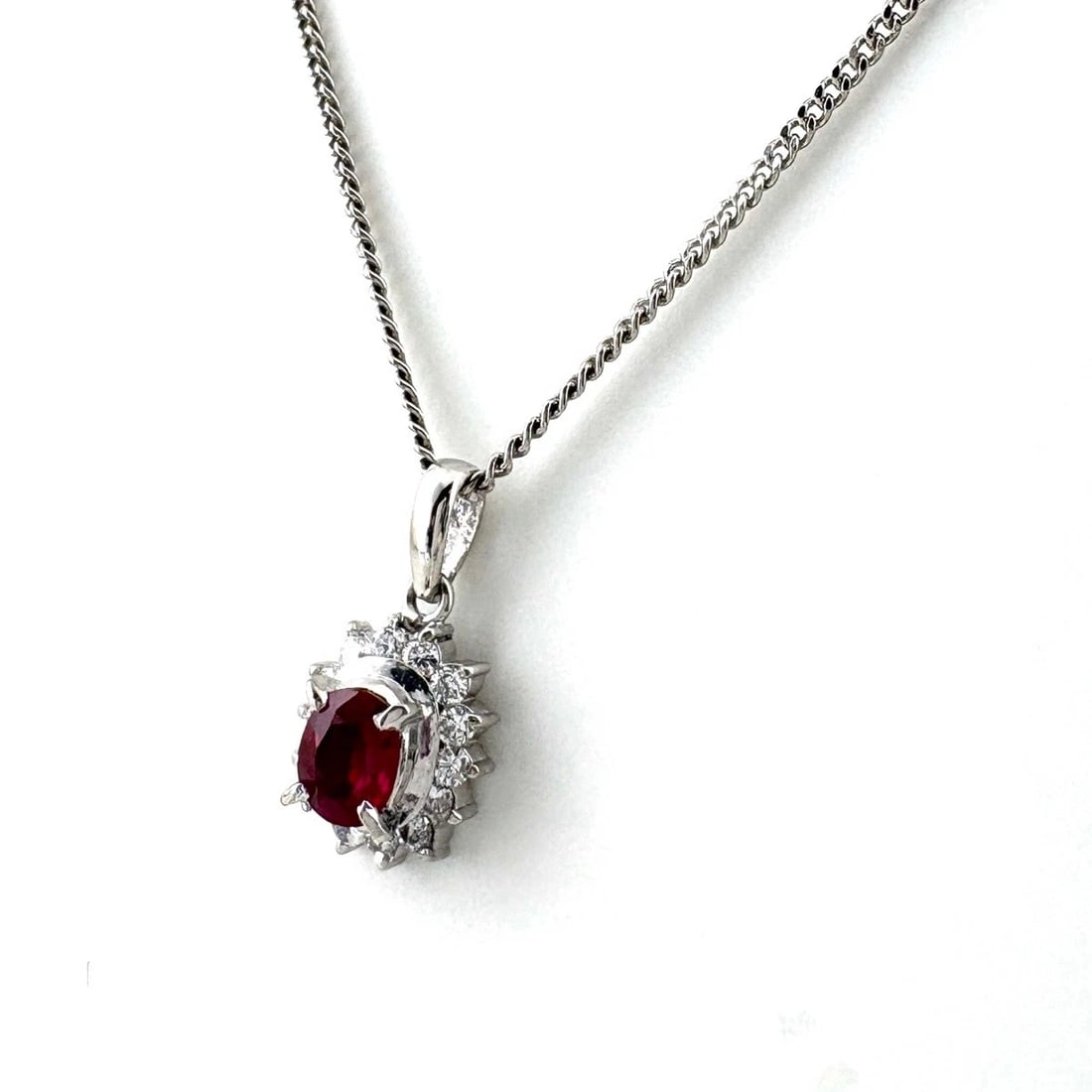 RUBY DESIGN NECKLACE PLATINUM PENDANT: Ruby Design Necklace Platinum Pendant Brand: Unbranded Type: Necklace Material: Pt900, Main Stone/Creation Ruby Color: Platinum Size: Chain 39.5cm(15.6") Total length of the pendant head including