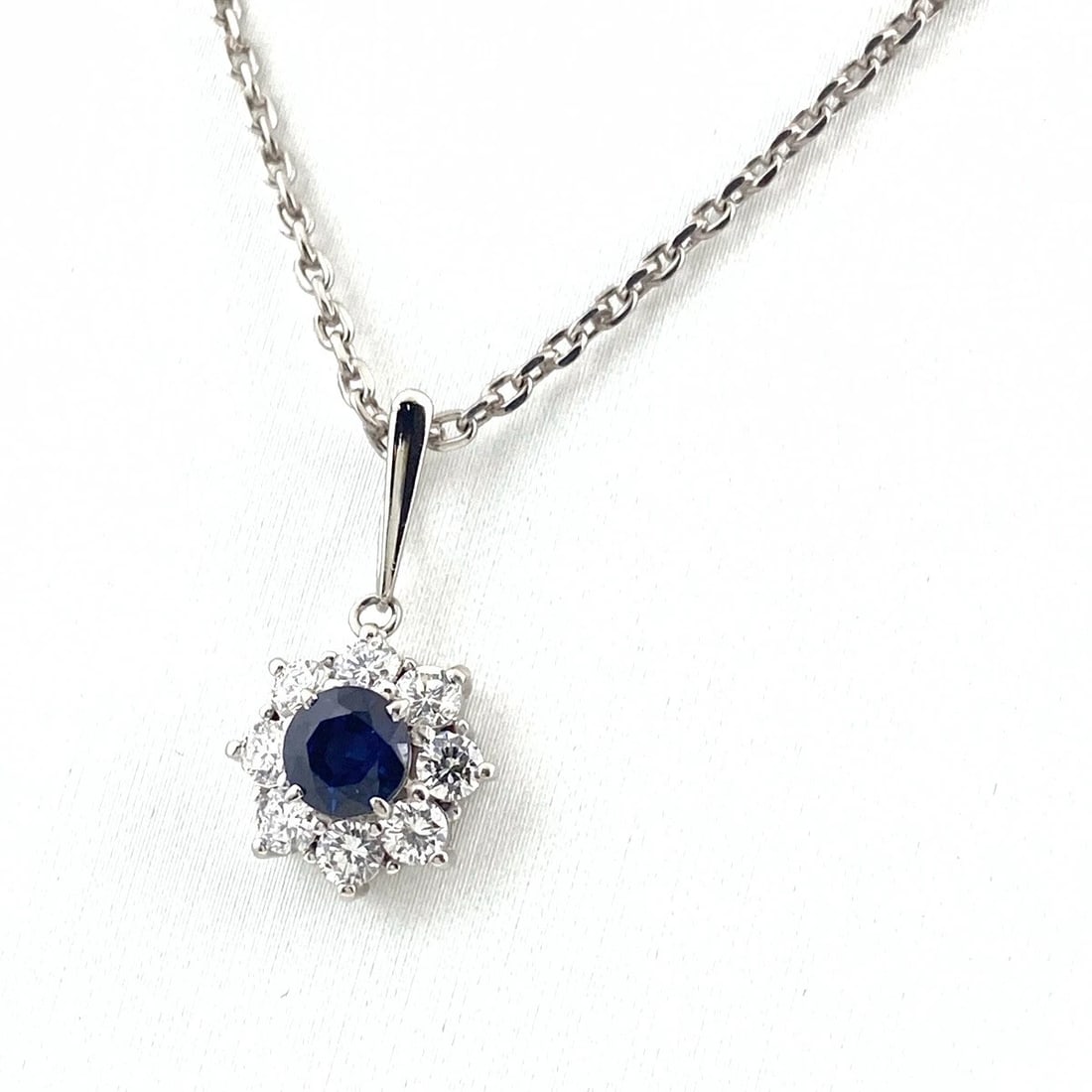 SAPPHIRE DESIGN NECKLACE PLATINUM PENDANT: Sapphire design necklace Platinum Pendant Brand: Unbranded Type: Necklace Material: Pt850, Main Stone/Creation Sapphire Color: Platinum Size: Chain 40.5cm(15.9") otal length of the pendant head in