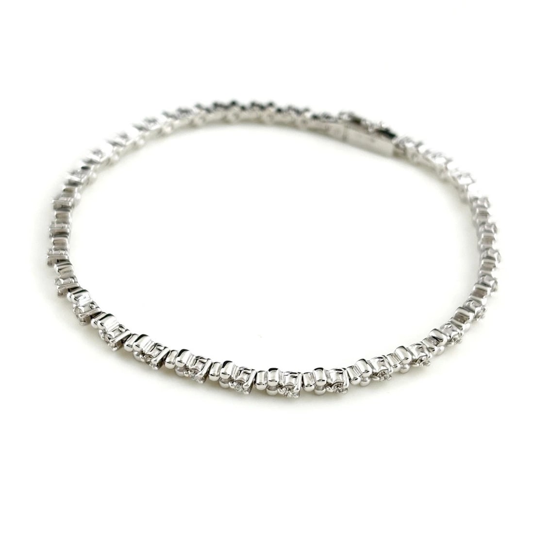 TASAKI MELEE DIAMOND DESIGN BRACELET: TASAKI Melee diamond design bracelet Brand: TASAKI Type: Bracelet Material: 18K, Color: White Gold Size: Wrist Size 18cm(7.1") Maximum Bracelet width 3.1mm(0.1") Accessories: None Accessor