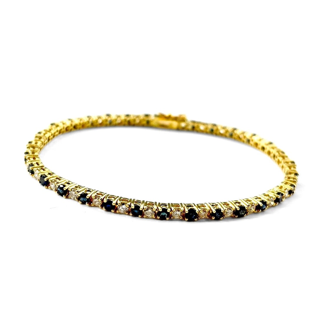 SAPPHIRE DESIGN BRACELET YG YELLOWGOLD: Sapphire Design Bracelet YG YellowGold Brand: Unbranded Type: Bracelet Material: 18K, Main Stone/Creation Sapphire Color: Yellow Gold Size: Wrist Size 17.5cm(6.9") Maximum Bracelet width
