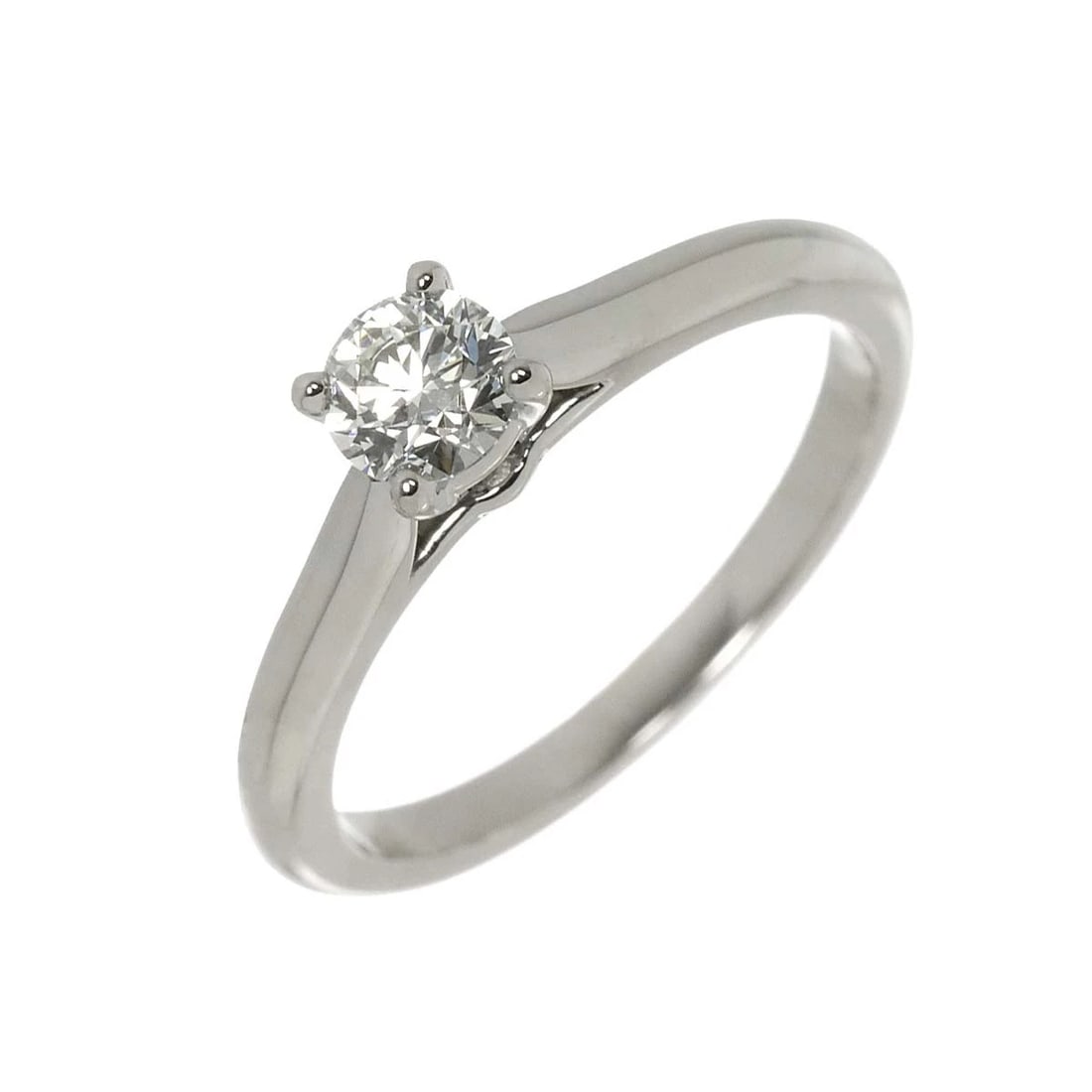CARTIER SOLITAIRE DIAMOND RING: Cartier Solitaire Diamond Ring Brand: Cartier Type: Ring Material: Platinum, Main Stone/Creation Natural Color: Platinum Size: 5.25 (US) Accessories: None Accessories Notice: When purchasing