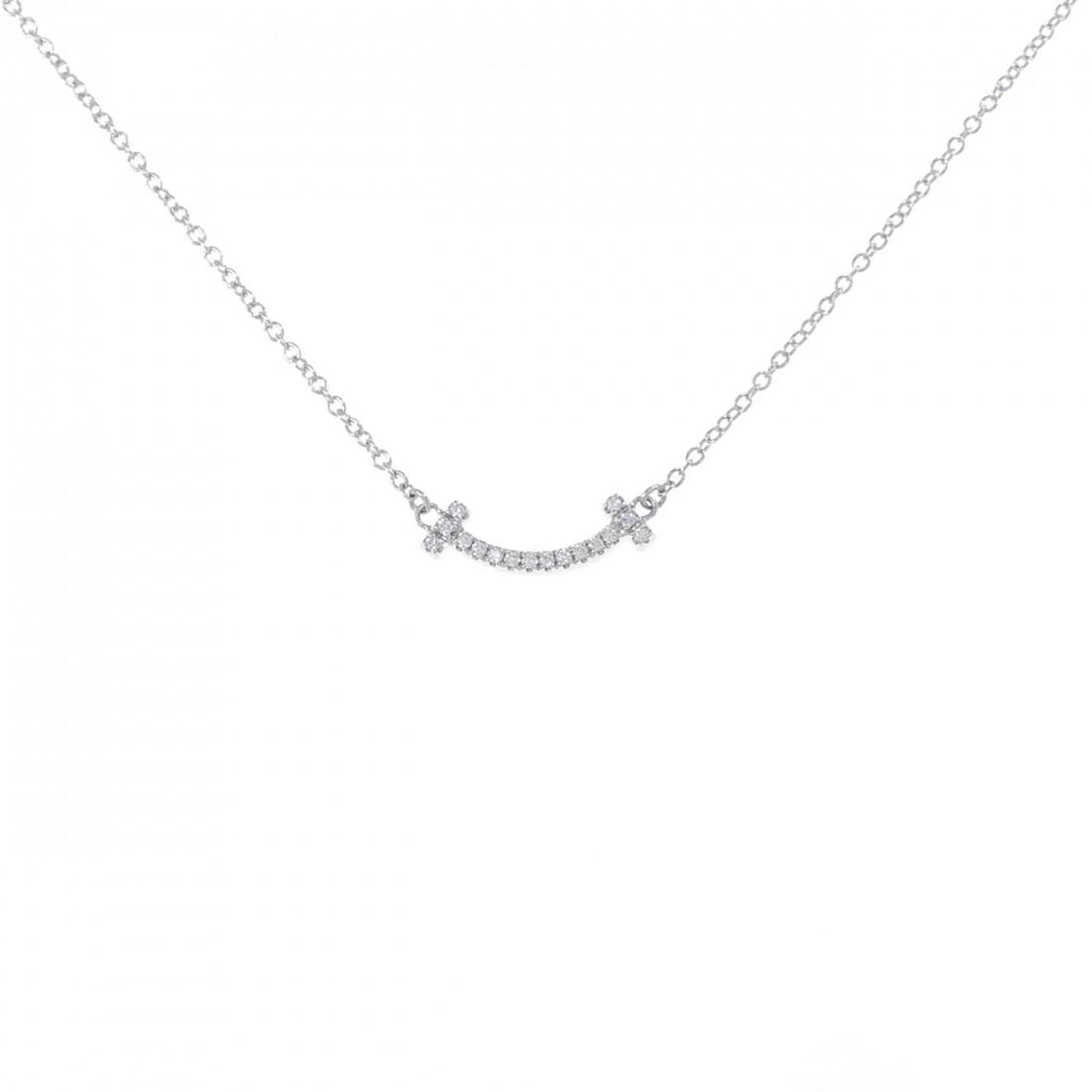 TIFFANY T SMILE MINI NECKLACE: Tiffany T Smile mini Necklace Brand: Tiffany Type: Necklace Material: 750 White Gold, Main Stone/Creation Natural Color: White Gold Size: 41/46cm,ActualSize Pendant top H x W: 4.5mmx13.8mm