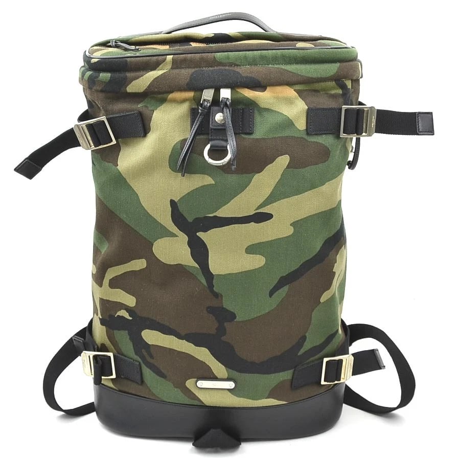 SAINT LAURENT CAMOUFLAGE BACKPACK KHAKI/BLACK BACKPACK: SAINT LAURENT Camouflage Backpack Khaki/Black Backpack Brand: SAINT LAURENT Type: Backpack Material: canvas Color: Khaki X Black Size: W:11.4inx H:17.3inx D:5.7in Handle Length:5.3in 