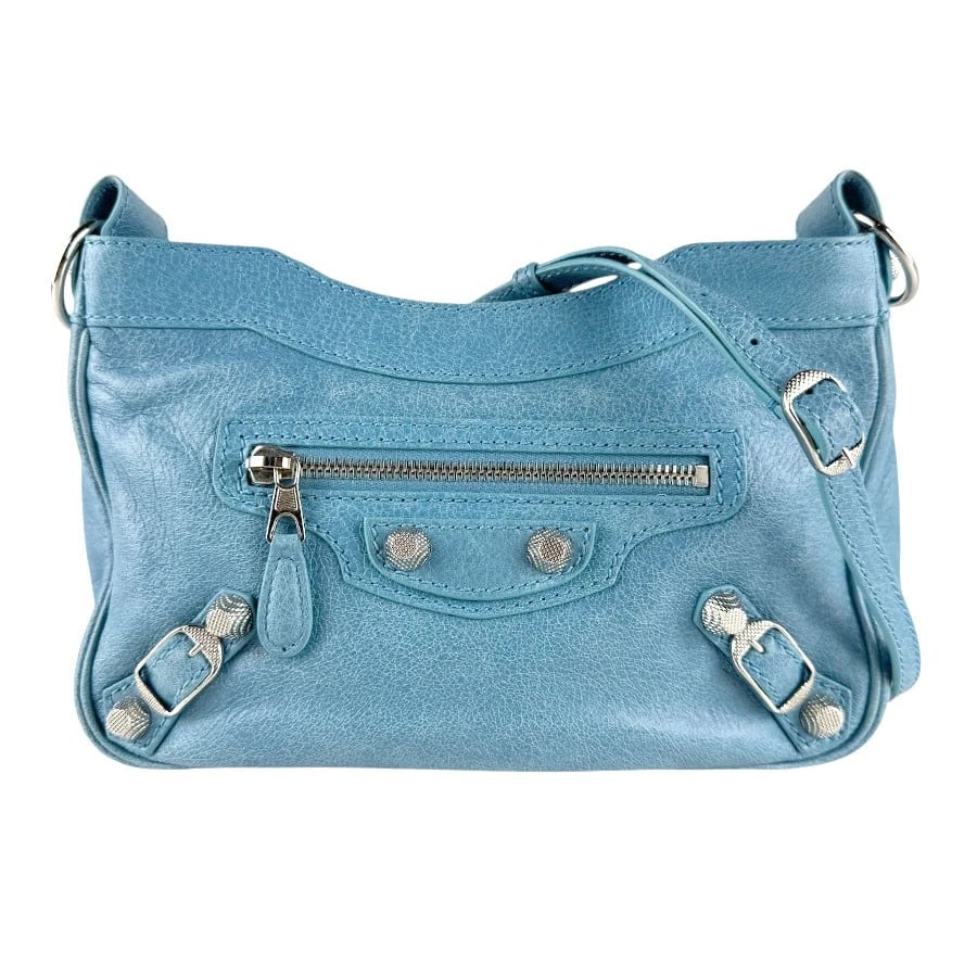 BALENCIAGA SHOULDER BAG LIGHT BLUE SHOULDER BAG: BALENCIAGA Shoulder Bag Light Blue Shoulder Bag Brand: BALENCIAGA Type: Shoulder Bag Material: Leather Color: Light Blue Size: W:9.1inx H:5.1inx D:2.0in Shoulder Length: 37.4in Accessories: None