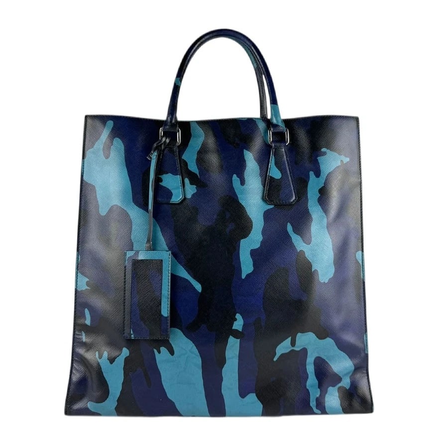 PRADA CAMOUFLAGE SHOULDER BAG HANDBAG BLUE SHOULDER BAG: PRADA Camouflage Shoulder Bag Handbag Blue Shoulder Bag Brand: PRADA Type: Shoulder Bag Material: leather Color: Blue Size: W:14.2inx H:14.6inx D:4.7in Handle Length:14.2in Accessories: None <