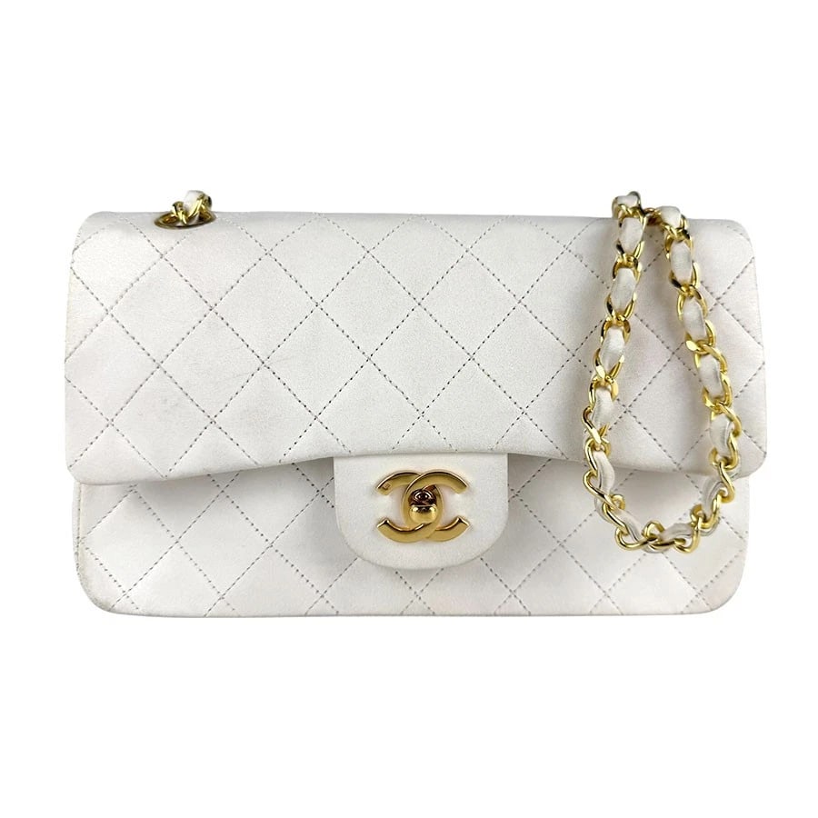 CHANEL MATELASSE DOUBLE FLAP SHOULDER BAG: CHANEL Matelasse Double Flap Shoulder Bag Brand: CHANEL Type: Shoulder Bag Material: Leather Color: White Size: W:9.1inx H:5.9inx D:2.4in Shoulder Length: 45.3in Accessories: None Accessories