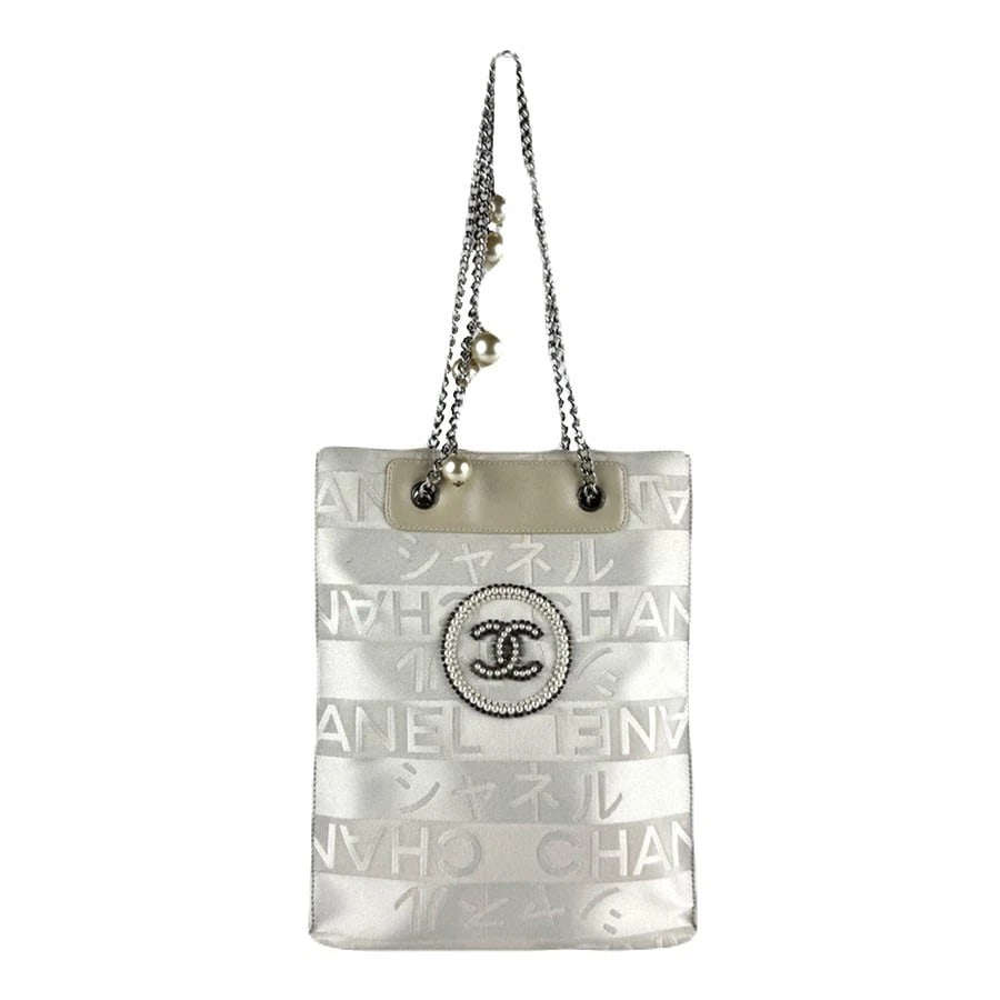 CHANEL EXCLUSIVE TO GINZA JAPAN TOTE BAG SHOULDER BAG: CHANEL Exclusive to Ginza Japan Tote Bag Shoulder Bag Brand: CHANEL Type: Shoulder Bag Material: Nylon Jacquard x Faux Pearl Color: Off White Size: W:8.3inx H:10.2inx D:3.1in Shoulder Length: 19.7