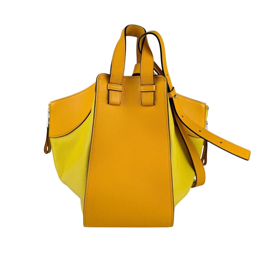 LOEWE HAMMOCK SHOULDER BAG HANDBAG ORANGE/YELLOW SHOULDER BAG: LOEWE Hammock Shoulder Bag Handbag Orange/Yellow Shoulder Bag Brand: LOEWE Type: Shoulder Bag Material: leather Color: Orange X Yellow Size: W:5.5inx H:9.8inx D:9.8in Handle Length:10.2in Accesso