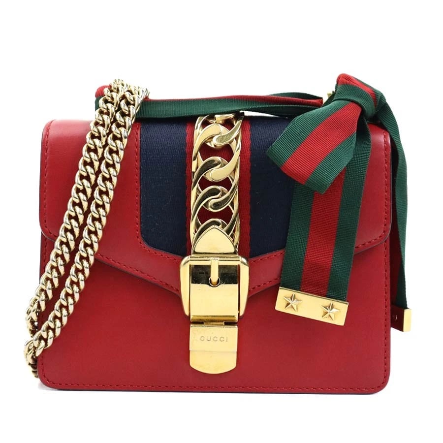 GUCCI SYLVIE SHOULDER BAG RED LEATHER SHOULDER BAG: GUCCI Sylvie Shoulder Bag Red Leather Shoulder Bag Brand: GUCCI Type: Shoulder Bag Material: leather Color: Red Size: W:7.3inx H:5.5inx D:2.0in Shoulder Length: 39.4in Accessories: None