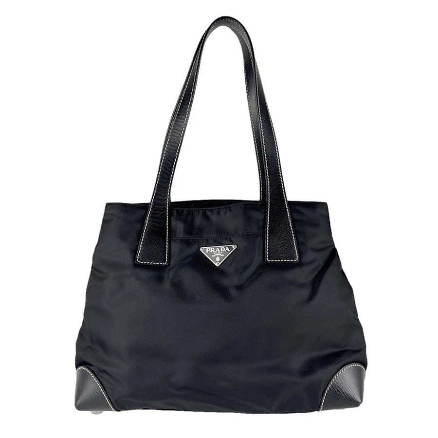 PRADA SHOULDER BAG BLACK NYLON/LEATHER/SILVERTONE SHOULDER BAG: PRADA Shoulder Bag Black Nylon/Leather/Silvertone Shoulder Bag Brand: PRADA Type: Shoulder Bag Material: Nylon x Leather Color: Black Size: W:11.4inx H:8.3inx D:5.5in Shoulder Length: 18.5in Acce