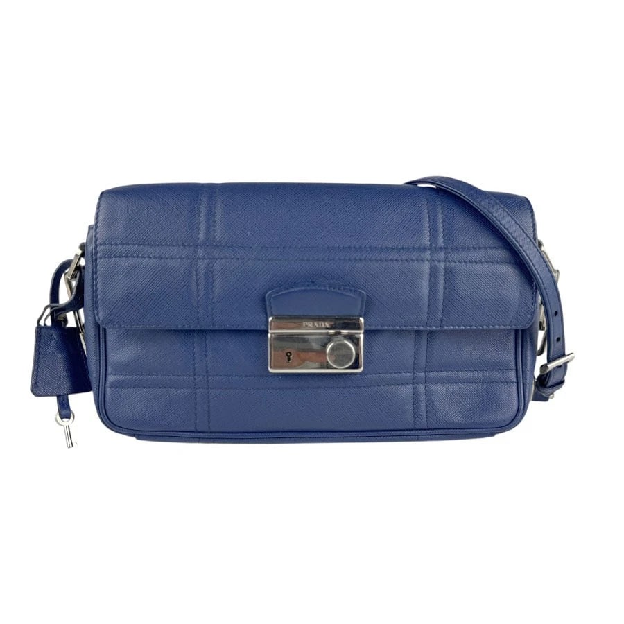 PRADA CHIAN SHOULDER BAG BLUE/SILVER LEATHER/METAL SHOULDER BAG: PRADA Chian Shoulder Bag Blue/Silver Leather/Metal Shoulder Bag Brand: PRADA Type: Shoulder Bag Material: leather Color: Blue Size: W:9.8inx H:6.3inx D:2.4in Shoulder Length: 40.6in Accessories: