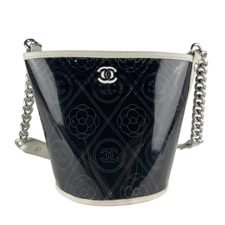 CHANEL CAMELLIA CHAIN SHOULDER BAG BLACK/WHITE PVC/LEATHER/SILVERTONE SHOULDER BAG: CHANEL Camellia Chain Shoulder Bag Black/White PVC/Leather/Silvertone Shoulder Bag Brand: CHANEL Type: Shoulder Bag Material: PVC x Leather Color: Black X White Size: W:5.9inx H:7.1inx D:5.9in Sho