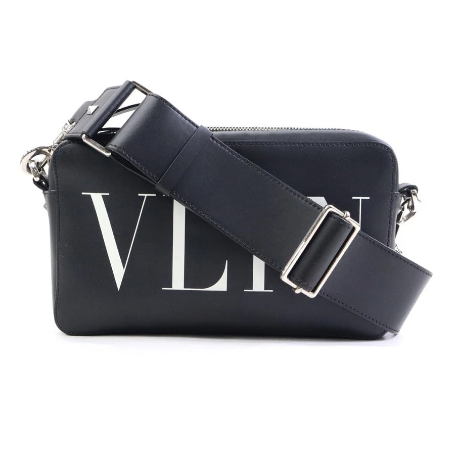 VALENTINO GARAVANI VLTN SHOULDER BAG BLACK/WHITE LEATHER/SILVERTONE SHOULDER BAG: Valentino Garavani VLTN Shoulder Bag Black/White Leather/Silvertone Shoulder Bag Brand: Valentino Garavani Type: Shoulder Bag Material: leather Color: Black Size: W:9.1inx H:5.1inx D:2.0in