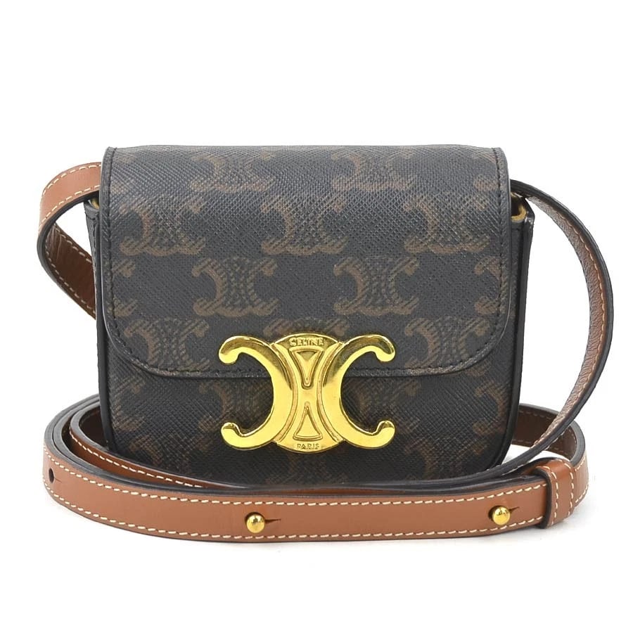 CELINE TRIOMPHE CROSSBODY SHOULDER BAG BROWN PVC/LEATHER/GOLDTONE SHOULDER BAG: CELINE Triomphe Crossbody Shoulder Bag Brown PVC/Leather/Goldtone Shoulder Bag Brand: CELINE Type: Shoulder Bag Material: PVC coated canvas Color: Brown Size: W:4.3inx H:3.5inx D:1.6in Shoulder Le