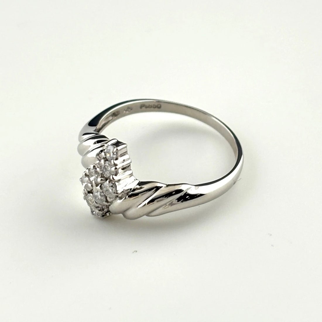 MELEE DIAMOND DESIGN RING PLATINUM: Melee diamond design Ring Platinum Brand: Unbranded Type: Ring Material: Pt850, Color: Platinum Size: US 6.5 to 7 Accessories: None Accessories Notice: When purchasing pre-owned goods, ple