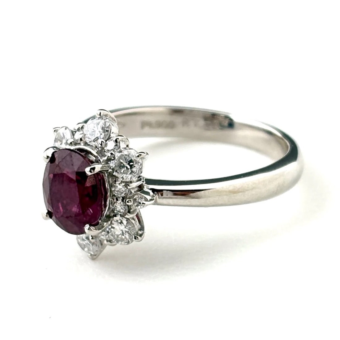 RUBY DESIGN RING PLATINUM MELEE: ruby design Ring Platinum Melee Brand: Unbranded Type: Ring Material: Pt900, Main Stone/Creation Ruby Color: Platinum Size: US 5.5 Accessories: None Accessories Notice: When purchasing pre