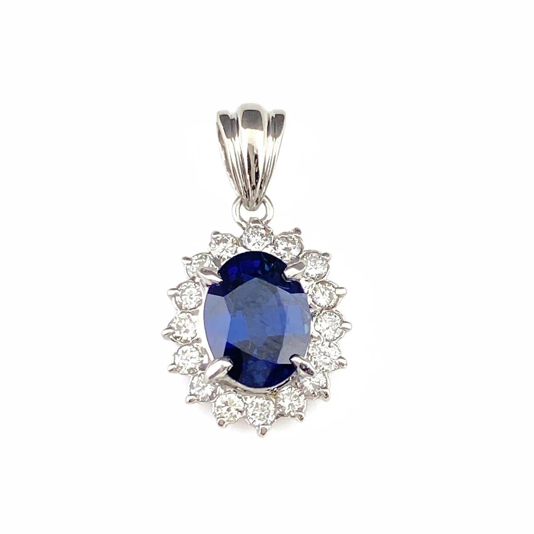 SAPPHIRE PENDANT HEAD PLATINUM MELEE DIAMOND: Sapphire Pendant Head Platinum Melee diamond Brand: Unbranded Type: Pendant Head Material: Pt900, Main Stone/Creation Sapphire Color: Platinum Size: Total length of the pendant head including