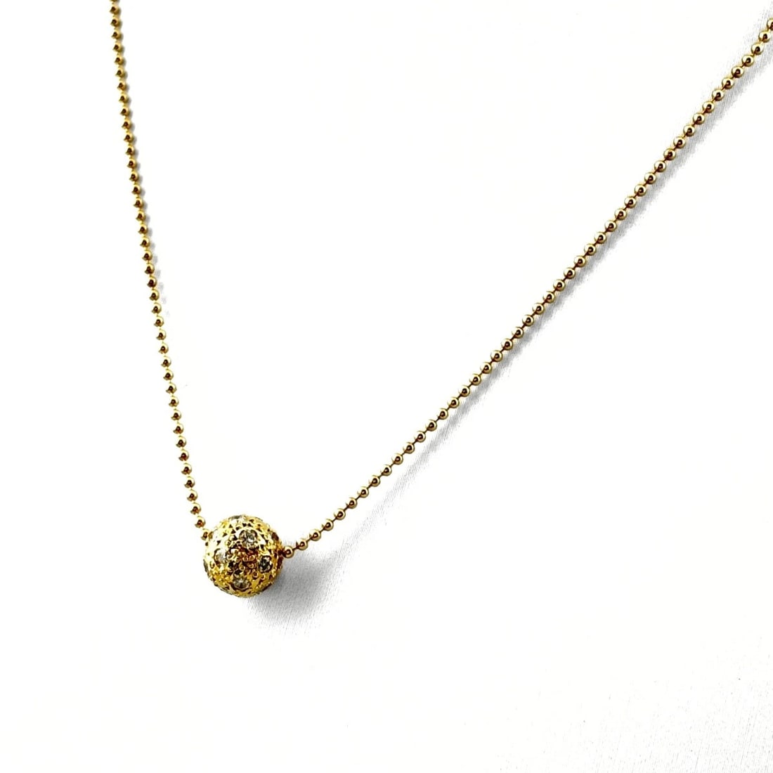 MELEE DIAMOND DESIGN YG YELLOWGOLD PENDANT NECKLACE: Melee diamond design YG YellowGold Pendant Necklace Brand: Unbranded Type: Necklace Material: 18K, Color: Yellow Gold Size: Chain 41cm(16.1") Pendant size 8.1×8.0mm(0.3") Accessories: None