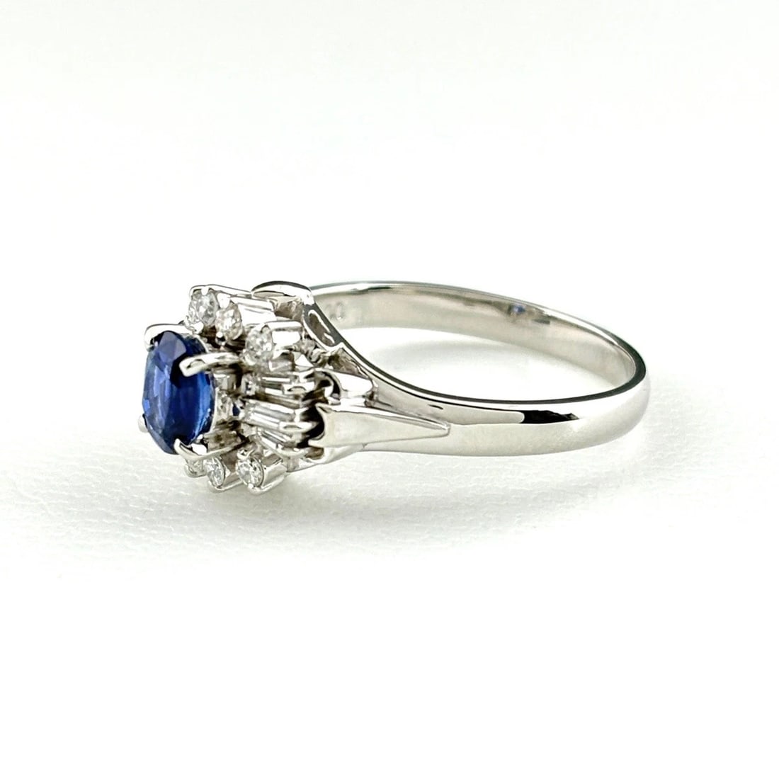 SAPPHIRE DESIGN PLATINUM MELEE DIAMOND RING: sapphire design Platinum Melee diamond Ring Brand: Unbranded Type: Ring Material: Pt900, Main Stone/Creation sapphire Color: Platinum Size: US 5.5 Accessories: None Accessories Notice: Whe