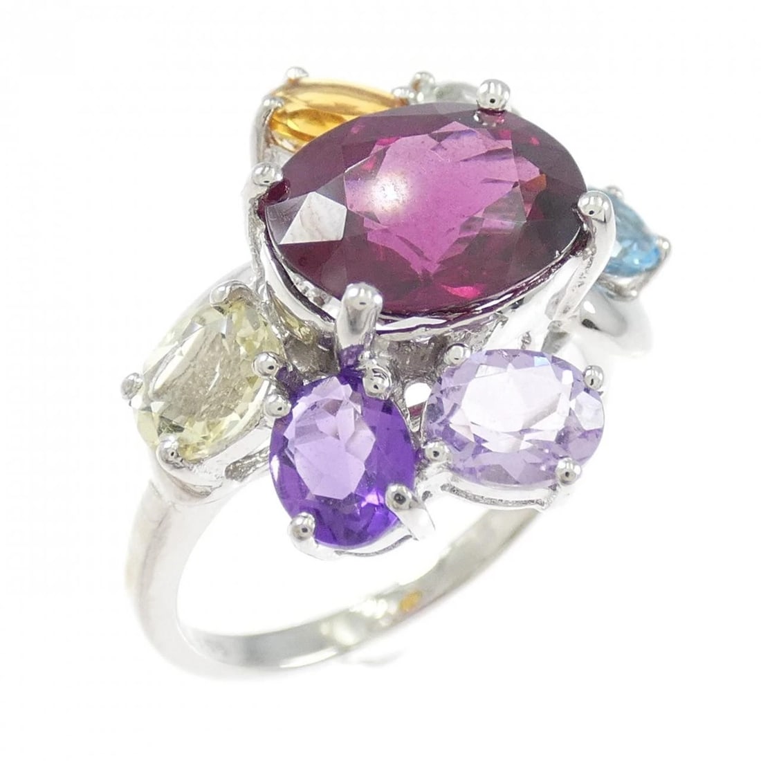 750WG GARNET RING: 750WG Garnet Ring Brand: Unbranded Type: Ring Material: 750 White Gold, Main Stone/Creation GarnetSide Stone Topaz Quartz Citrine Amethyst Color: White Gold Size: 6.5 (US size) Accessories: