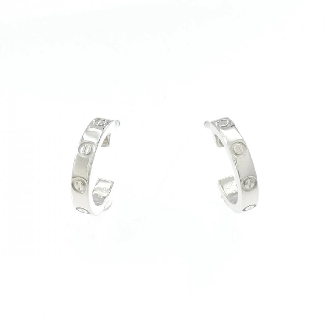 CARTIER MINI LOVE EARRINGS: Cartier Mini Love Earrings Brand: Cartier Type: Earrings Material: 750 White Gold, Color: White Gold Size: ActualSize HxW: 12.3mmx2.4mm Accessories: None Accessories Notice: When purchasing